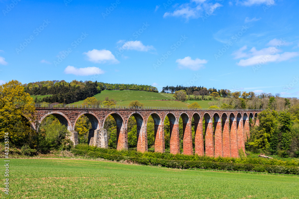 Ancient bridge in a river landscape