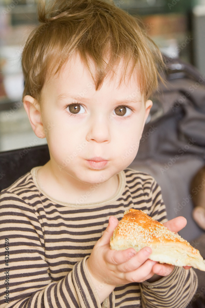 Boy eating cake