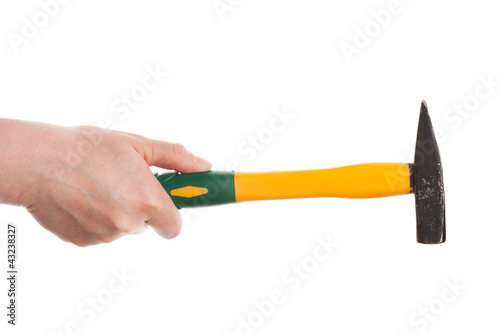 Female hand holding a hammer