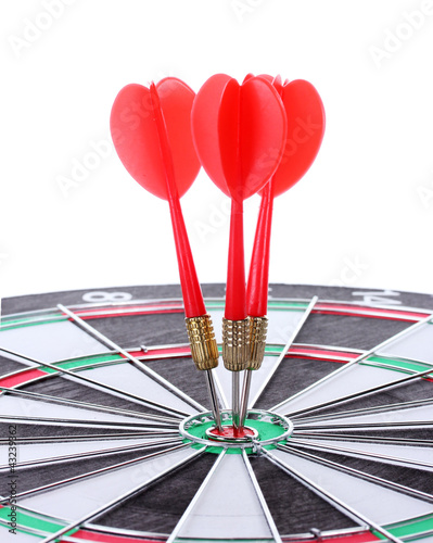 dart board with darts isolated on white