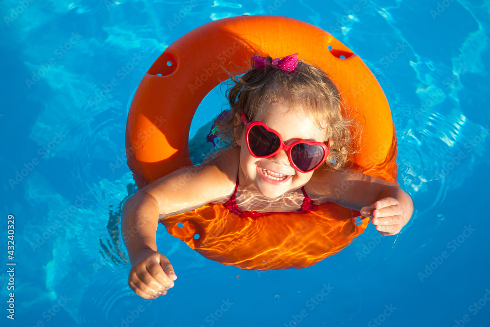 little girl swimming Stock Photo | Adobe Stock