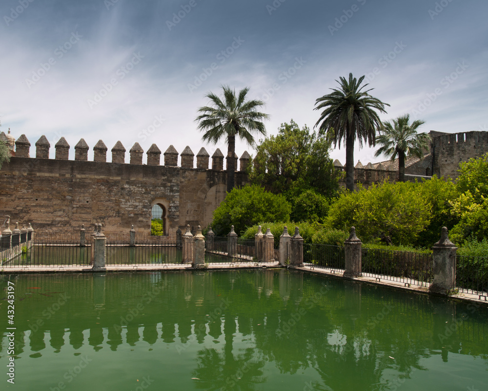 Castle wall and pond in Alcazar of Cordoba