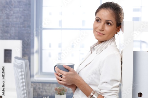 Businesswoman drinking tea Free Download Businesswoman drinking tea - GFXLoad