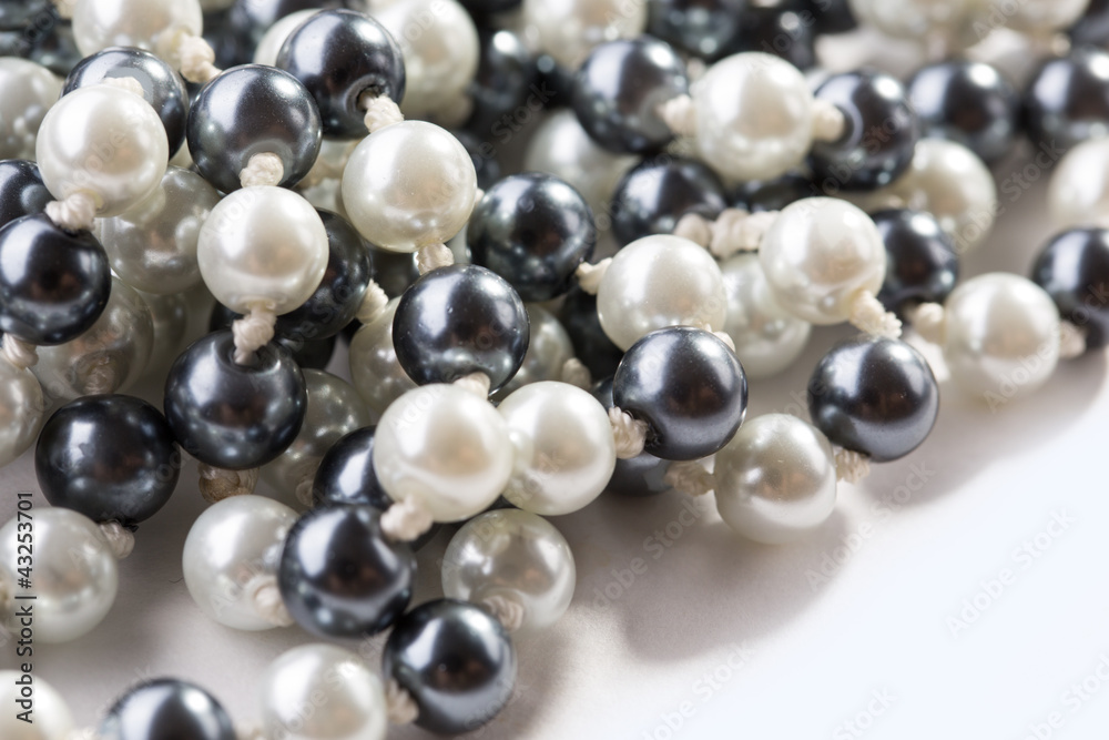 String of black and white pearls String of black and white pearls