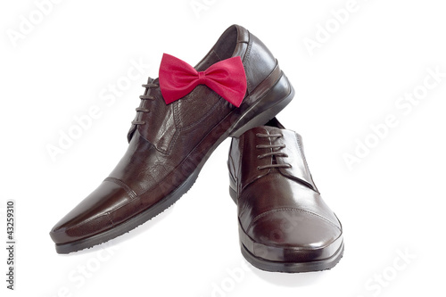 Concept of a fashion for the man - shoes and bow tie