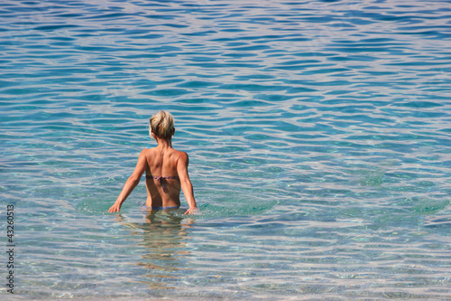 Young woman in the sea