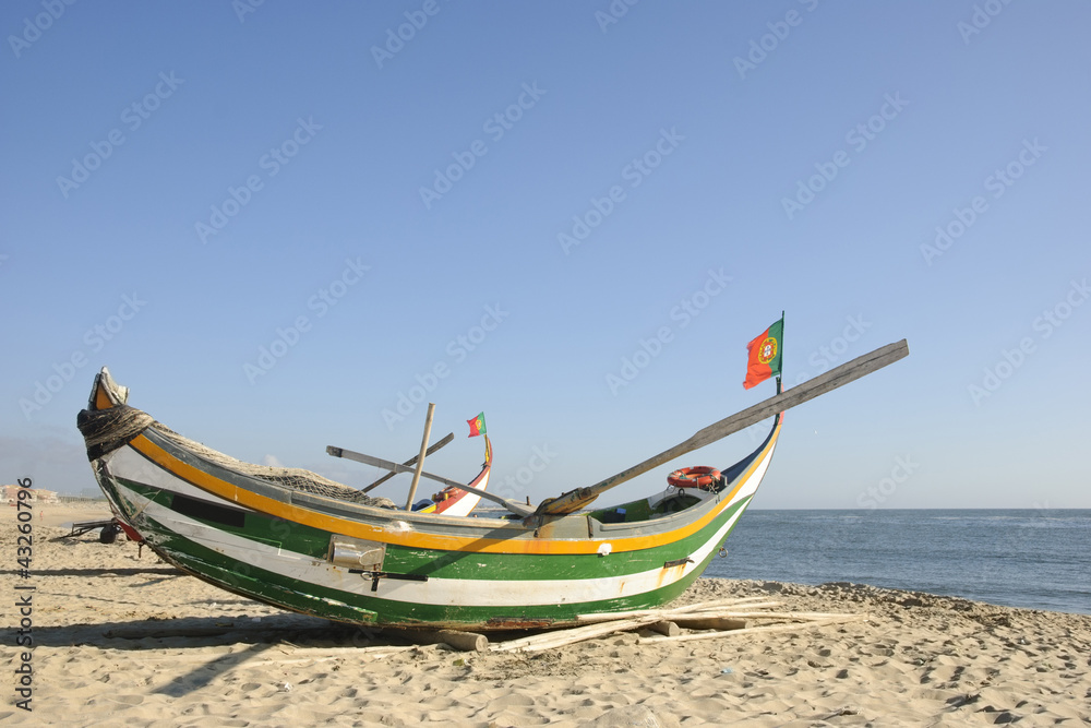 Typical portuguese fishing boat on the beach, Espinho, Portugal