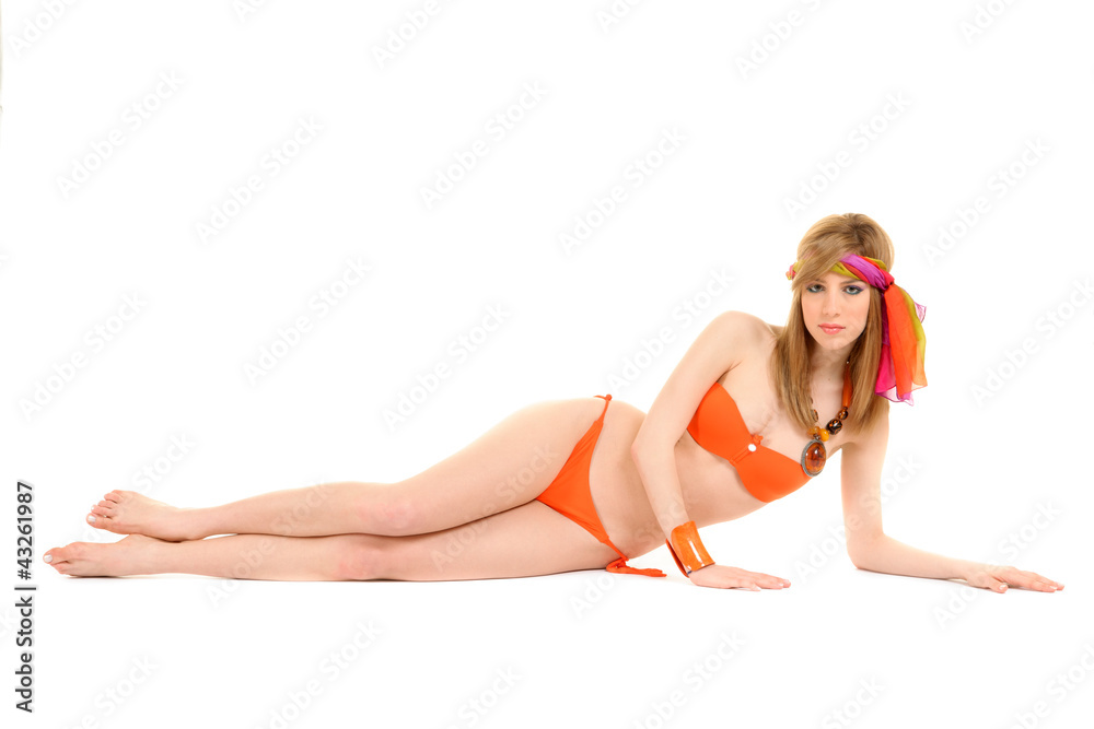 Obraz premium Young woman in orange bikini