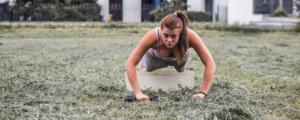 Sensual girl keep fit in a urban landscape