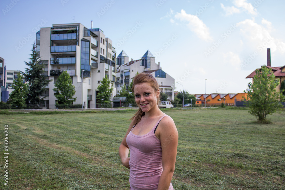 Sensual girl keep fit in a urban landscape