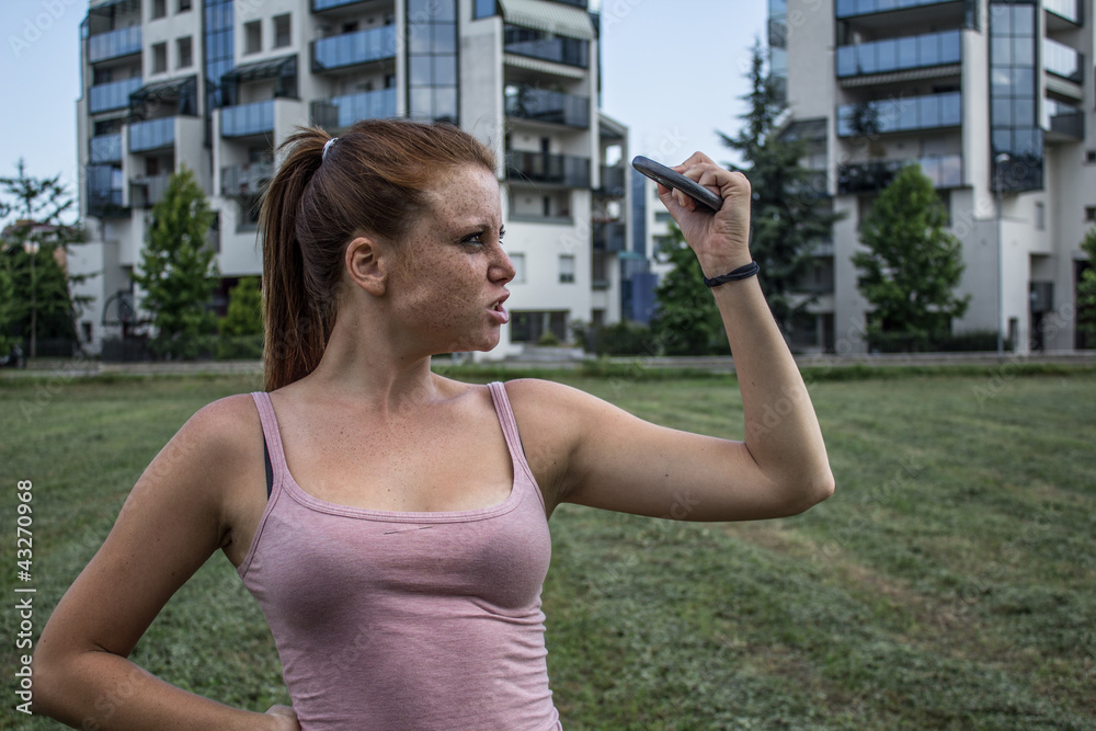 Sensual girl keep fit in a urban landscape