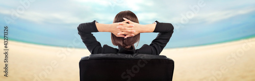 Closeup portrait of cute young business woman from behind dreami photo