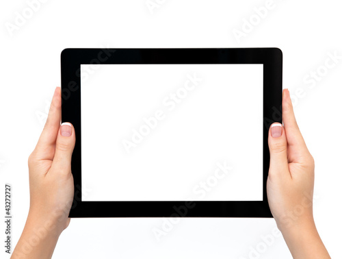 female hands holding a tablet