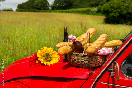 French car with bread and wine