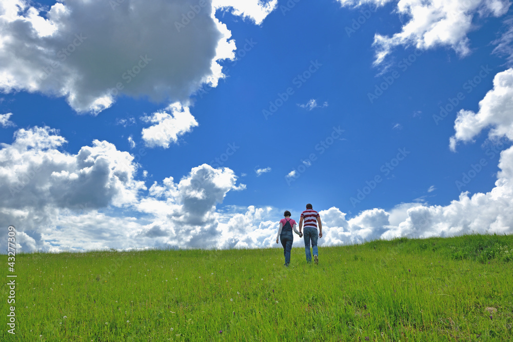 Portrait of romantic young couple smiling together outdoor