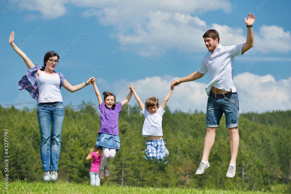 happy young family have fun outdoors happy young family have fun outdoors