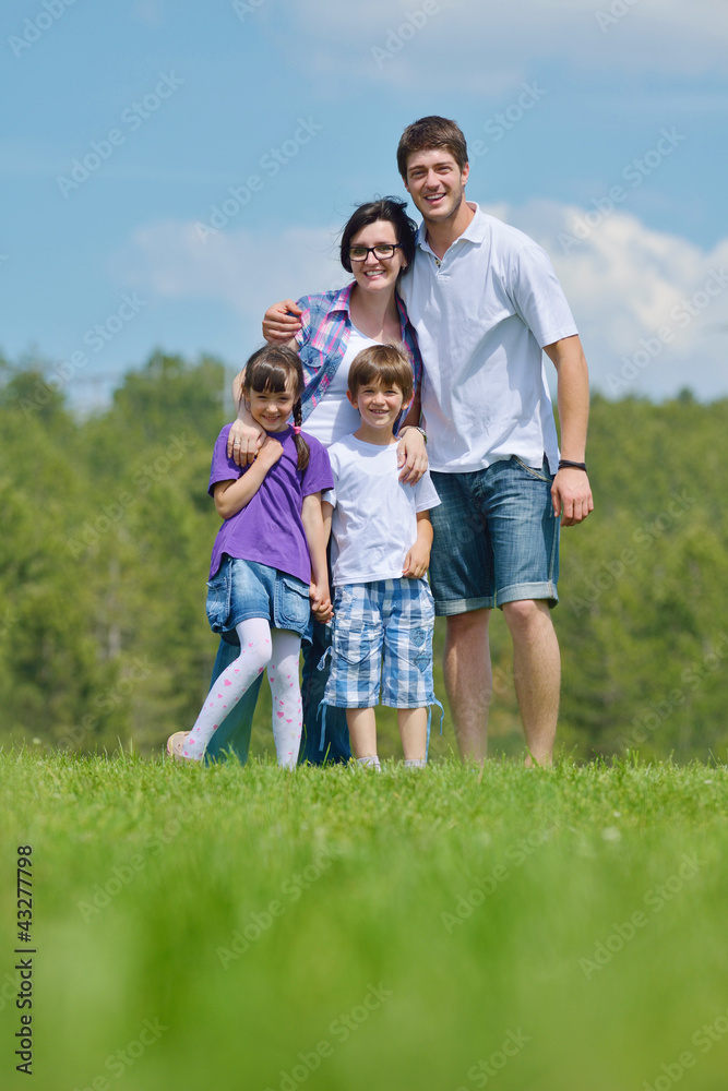 happy young family have fun outdoors happy young family have fun outdoors