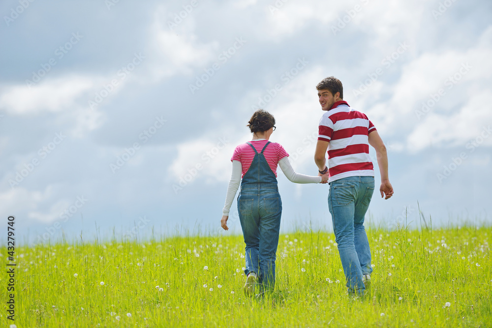 Portrait of romantic young couple smiling together outdoor Portrait of romantic young couple smiling together outdoor