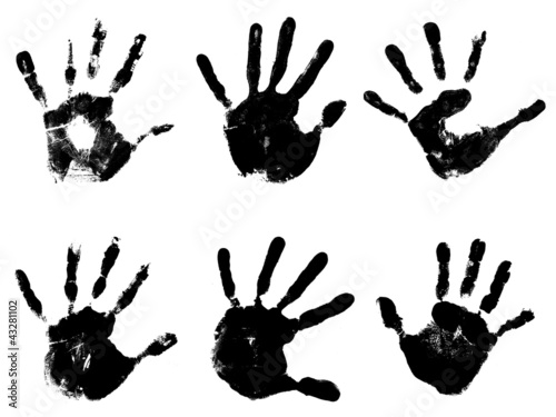 Conceptual black painted hand shape or print isolated on white