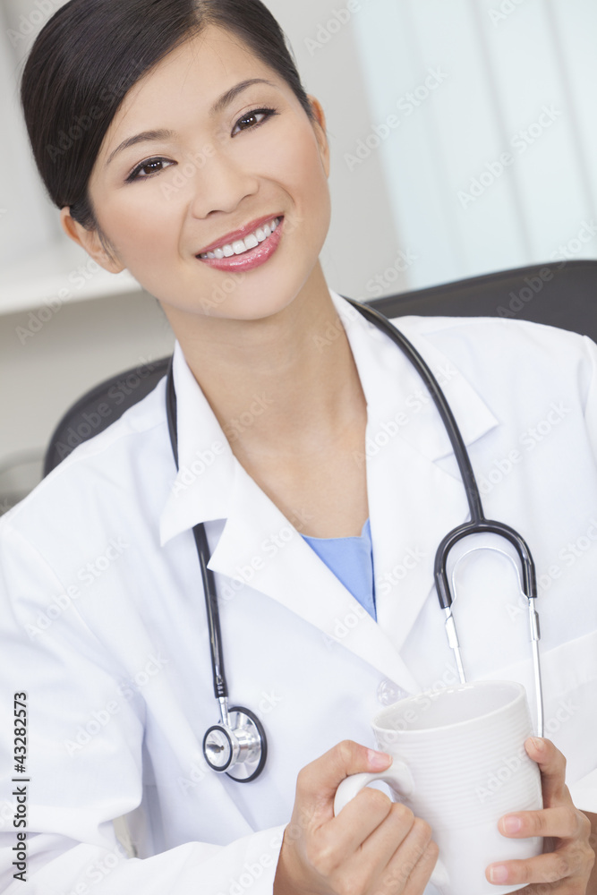Chinese Female Woman Doctor Drinking Coffee or Tea Chinese Female Woman Doctor Drinking Coffee or Tea