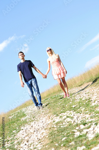 Young couple holding hand