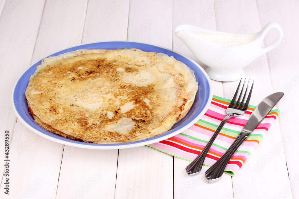 Stack of tasty pancakes on wooden background Stack of tasty pancakes on wooden background