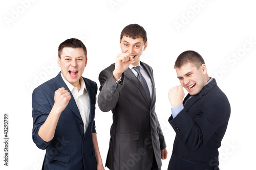 Successful young businesspeople gesturing with fists isolated on
