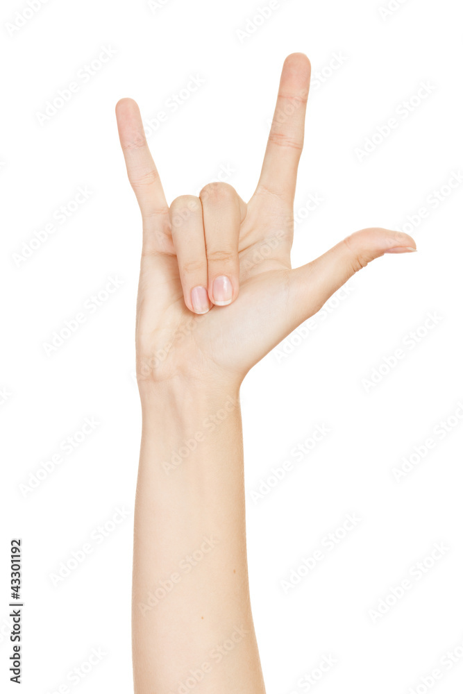 woman hand giving the devil horns gesture (isolated on white bac woman hand giving the devil horns gesture (isolated on white bac