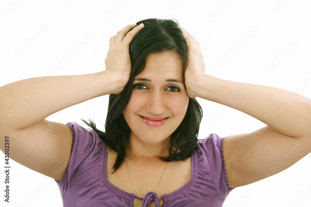 Headache - Young woman holding head in pain over white backgroun Headache - Young woman holding head in pain over white backgroun