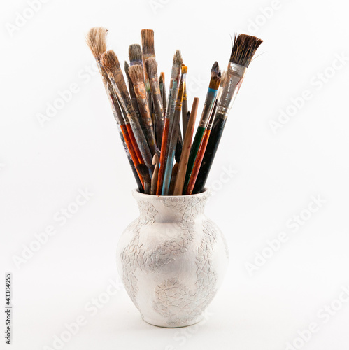 jug with brushes