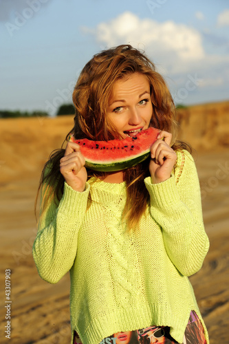 Beautiful woman, eating watermelon