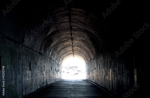 Long Dark Tunnel With Light At The End