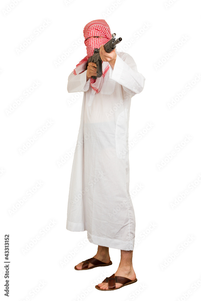 Man aiming machine while standing against white background