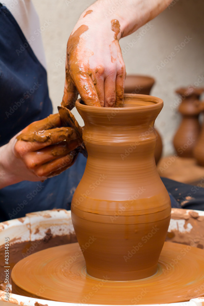 potter makes a jug out of clay potter makes a jug out of clay