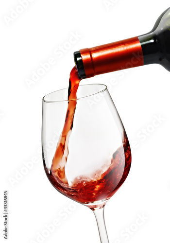 Pooring red wine in a wine glass