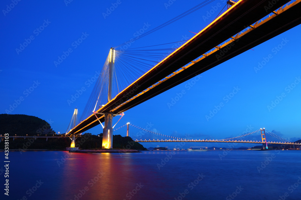 Fototapeta premium Ting Kau Bridge and Tsing ma Bridge at evening, in Hong Kong