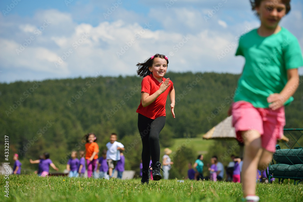 happy kids group  have fun in nature