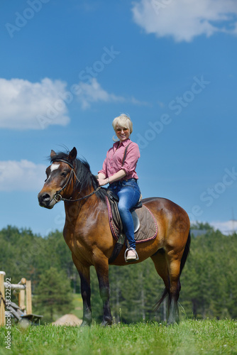 happy woman  on  horse © .shock