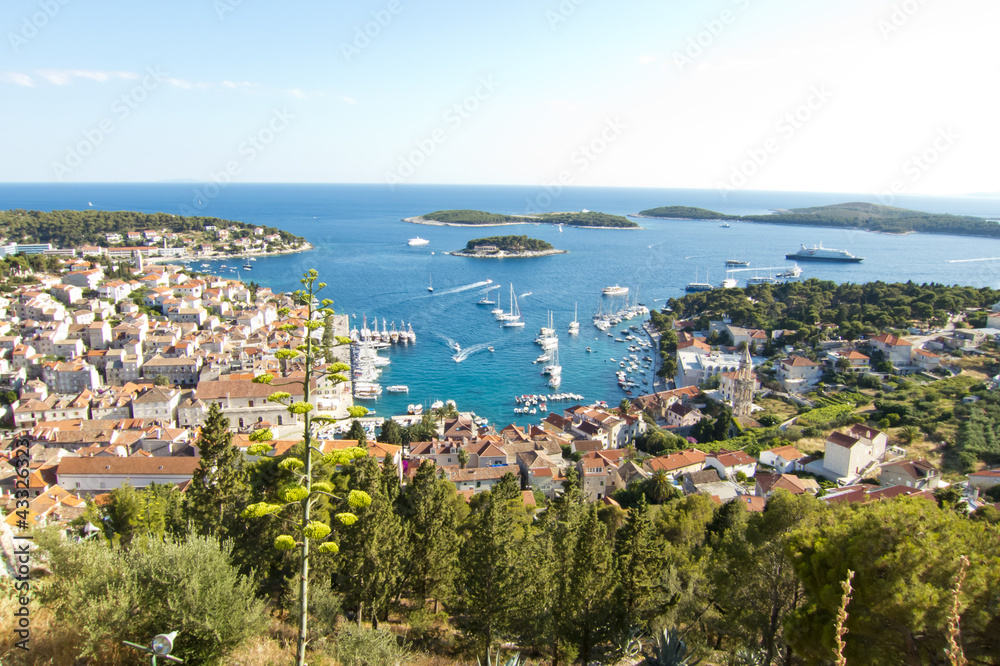 Hvar, harbor of old Adriatic island town. panoramic view. Popula