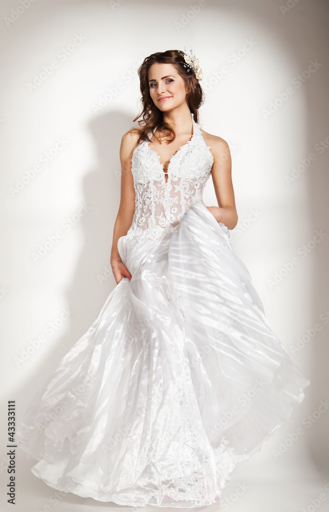 Portrait of beautiful young bride on white Portrait of beautiful young bride on white