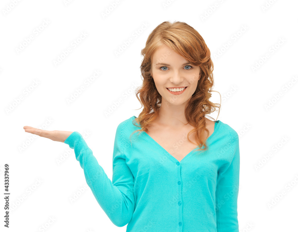 girl showing something on the palm of her hand girl showing something on the palm of her hand
