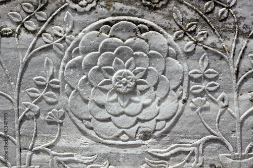 ancient marble flower carving