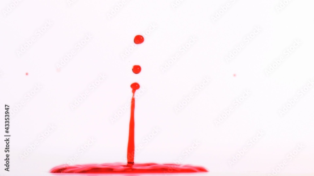 Splash of red liquid in super slow motion Splash of red liquid in super slow motion