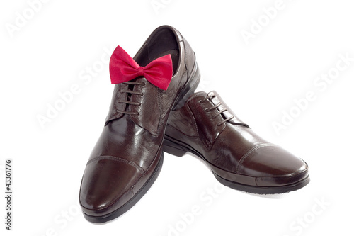Concept of a fashion for the man - shoes and bow tie