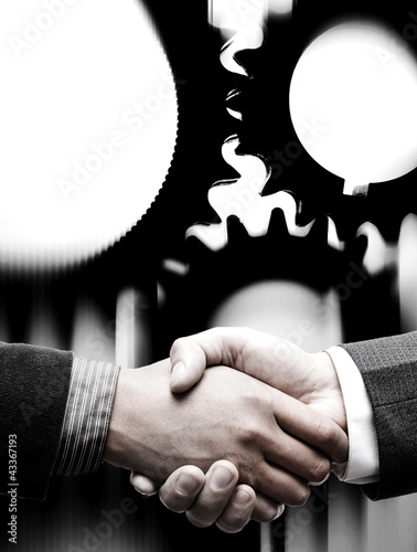 handshake with gears background