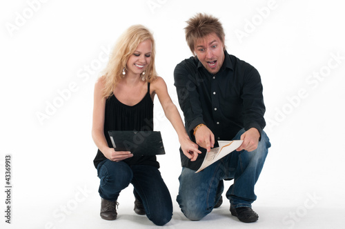 Boy and girl crouch