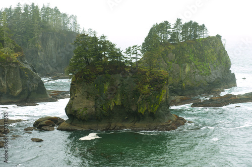 Rock formations in ocean photo