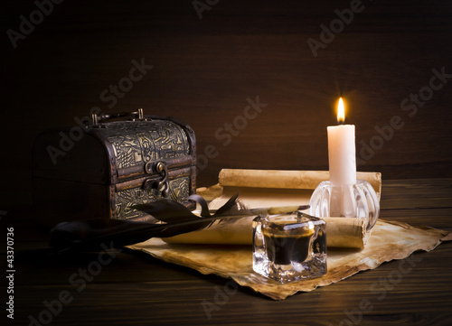 old papers and books on a wooden table © ulkan