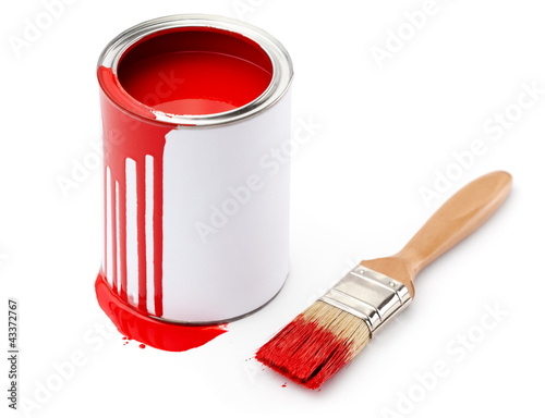 Fototapeta Naklejka Na Ścianę i Meble -  Full of red paint tin and paintbrush which is dirty with red ink