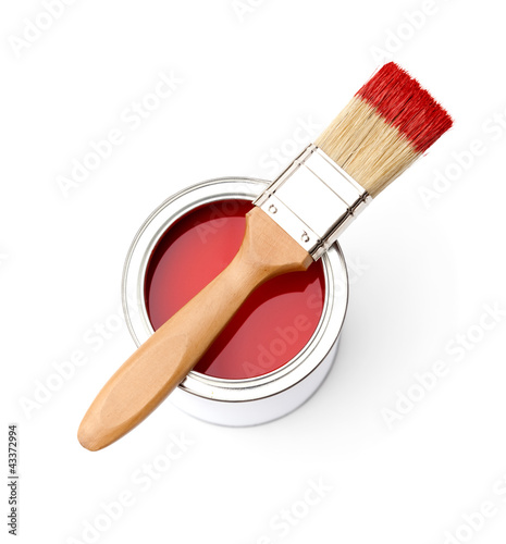 Fototapeta Naklejka Na Ścianę i Meble -  Full of red paint tin and paint brush on it, isplated on white